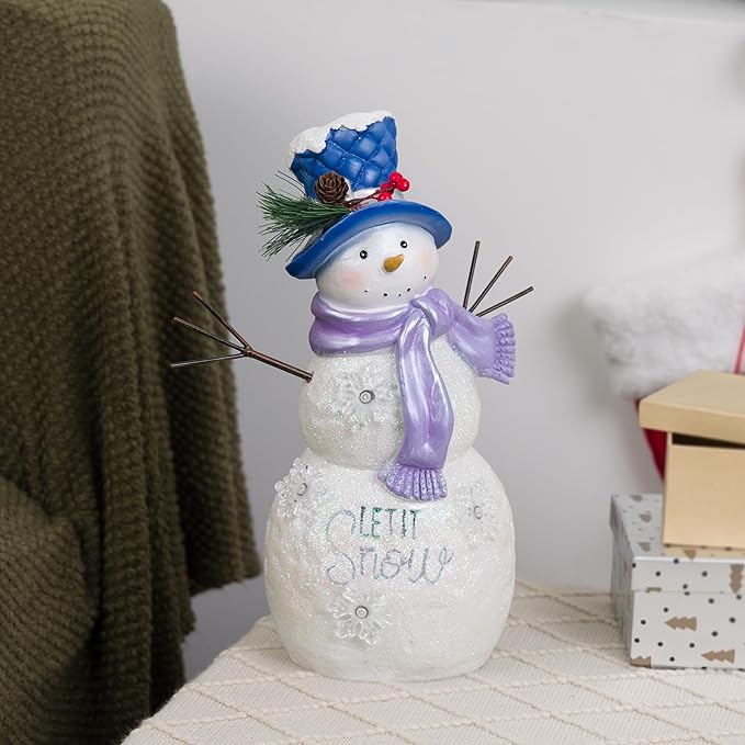 Alpine Corporation 14”H Lavender Winter "Let It Snow" Snowman Statue with Fading LED Lights, Christmas Decor