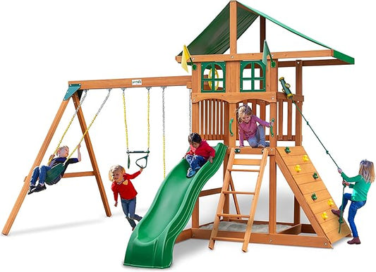 Gorilla Playsets 01-1077 Avalon Treehouse Wooden Swing Set with Oversized Green Vinyl Canopy Roof, Climbing Wall, Ladder, Swings and Slide