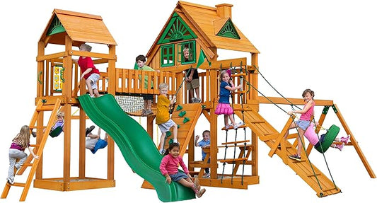 Gorilla Playsets 01-0055-AP Pioneer Peak Treehouse Wooden Swing Set with Amber Posts, Tire Swing, Slide and Tower with Clatter Bridge, Brown