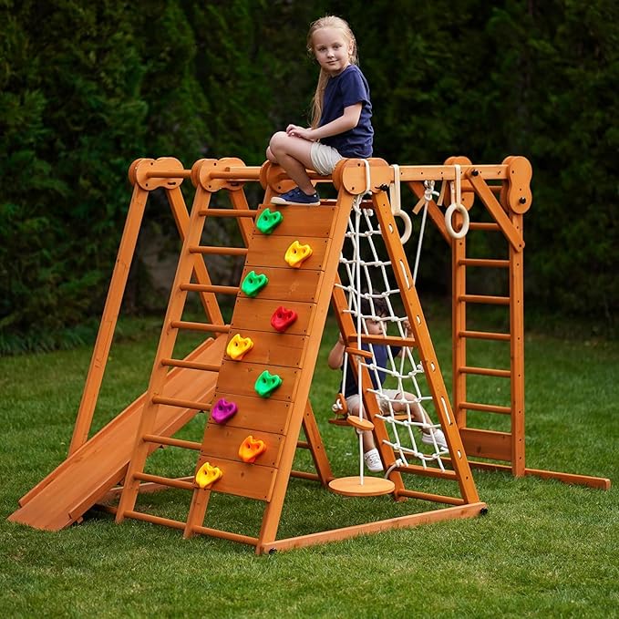 Avenlur 8-in-1 Small Indoor/Outdoor Playset ? Foldable Wooden Kids Play Set for Backyard ? Kid Playground for Toddlers Age 2?6 with Slide, Monkey Bars, 2 Ladders, 2 Swings, Rock Climbing, Gym Rings
