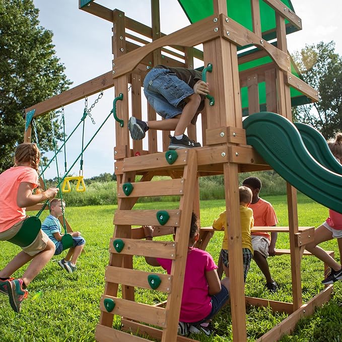 Backyard Discovery Belmont Cedar Wood Swing Set with Wave Slide, Play Deck, Rock Wall Ladder, Snack Bar Window, Shaded Picnic Area, Bench, Belt Swings, Trapeze, Sandbox Area, Canopy, Outdoor Playset