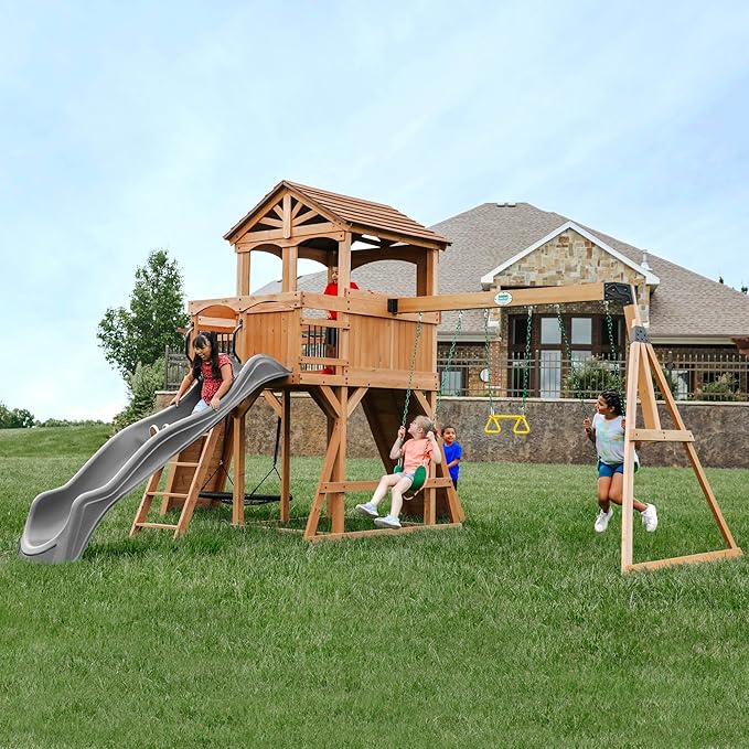 Backyard Discovery Sterling Point Cedar Wood Swing Set with Wave Slide, Raised Clubhouse, Wooden Bridge, Rock Wall, Belt Swings, Web Swing, Trapeze, Balcony, Climbing Wall, Ladder, Outdoor Playset